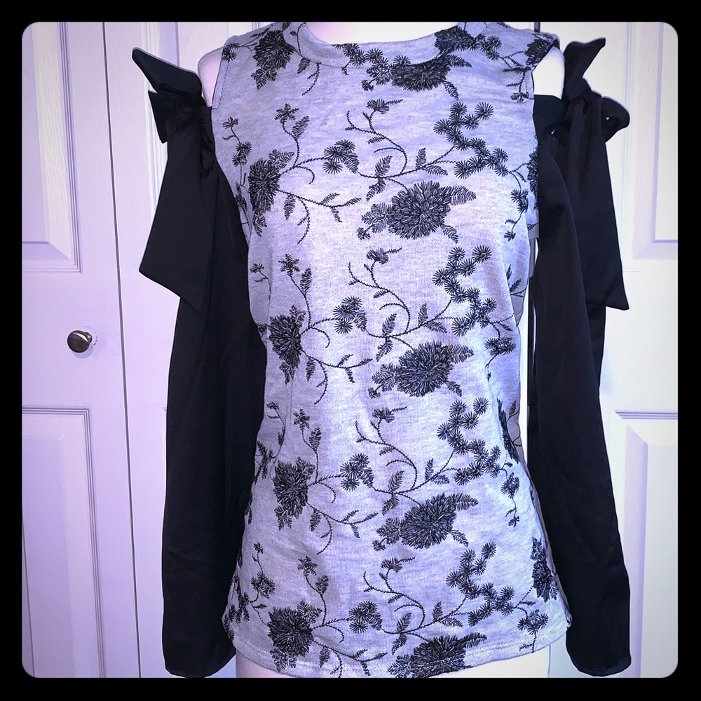 Unique cold shoulder top!